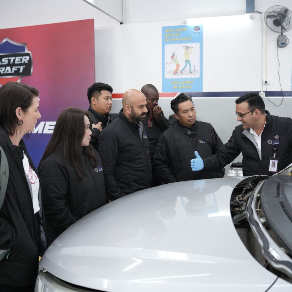 An expert demonstrates refinishing techniques at the Mastercraft Bodyshop, part of the GFC 2025 events.