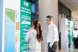 A booth showcasing sample floor coating products from Nippon Paint.