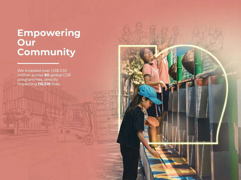 A young girl carefully painting a vibrant mural on a public wall alongside other students.